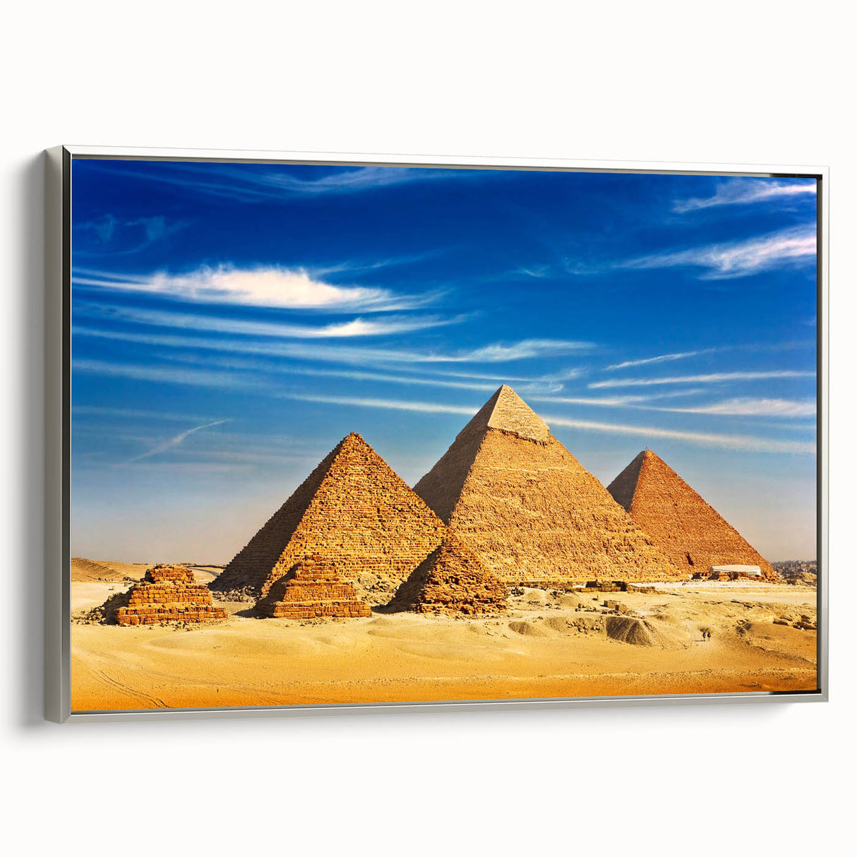 Vintage poster art of an Egyptian scene on a silver-framed canvas, featuring vibrant colors, ideal for living room decor.