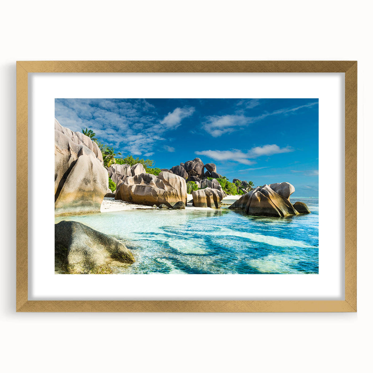 Abstract art print of Seychelles scenery in muted blue and green tones, framed in gold, ideal for dining room decor.