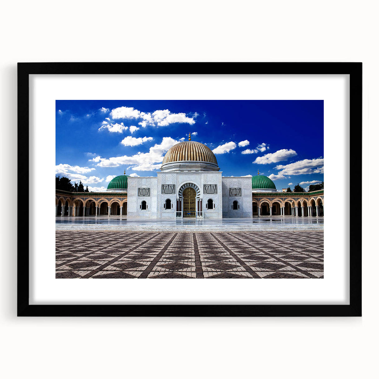 Extra large abstract art print of a colorful, textured Tunisian landscape in a black frame, ideal for living room decor.