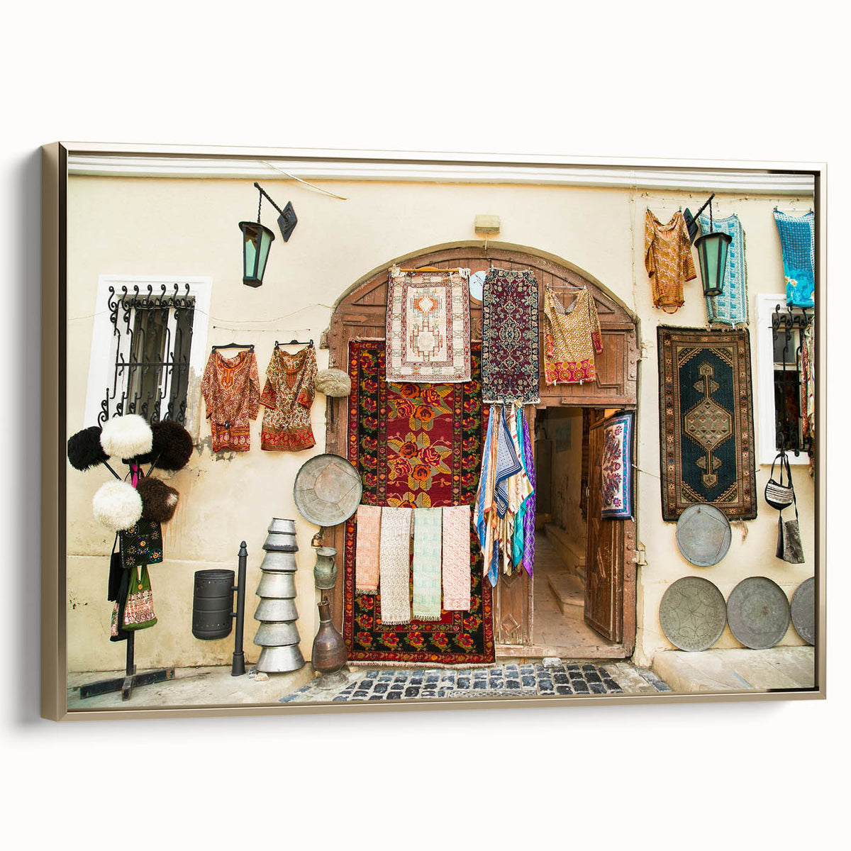 Framed canvas featuring a vintage-style landscape painting of an Azerbaijani scenery in muted gold and black tones.