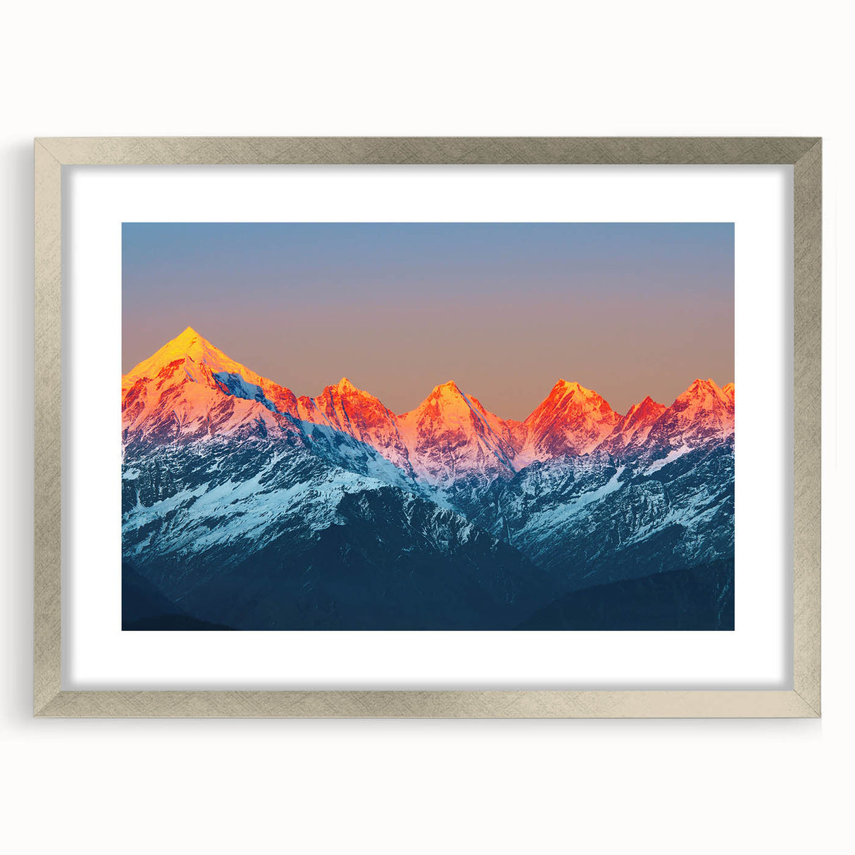 Textured abstract art print depicting a serene Indian landscape in muted earth tones, framed in silver.