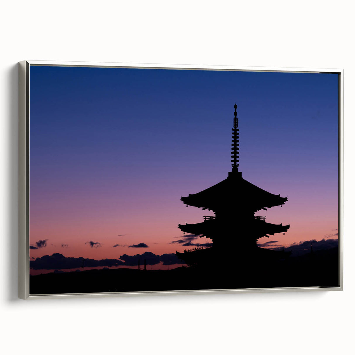 Framed canvas featuring a vintage-style landscape painting of Kyoto with colorful trees and a black background.