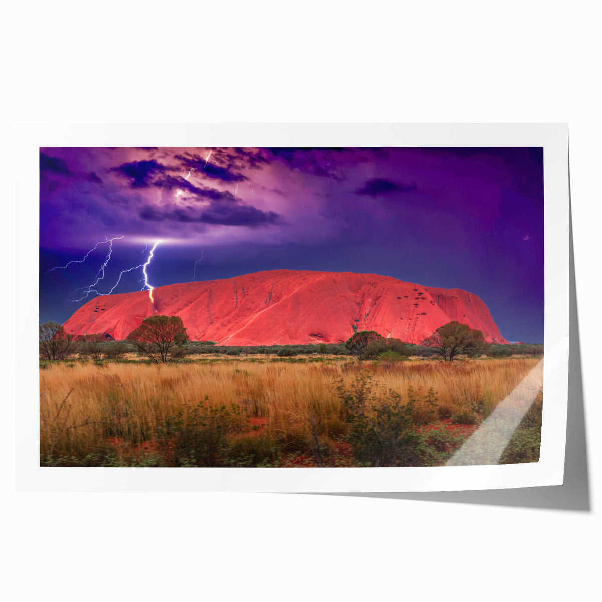 Rolled print of Ayers Rock in Australia with muted earth tones, suitable for art wall dining room.