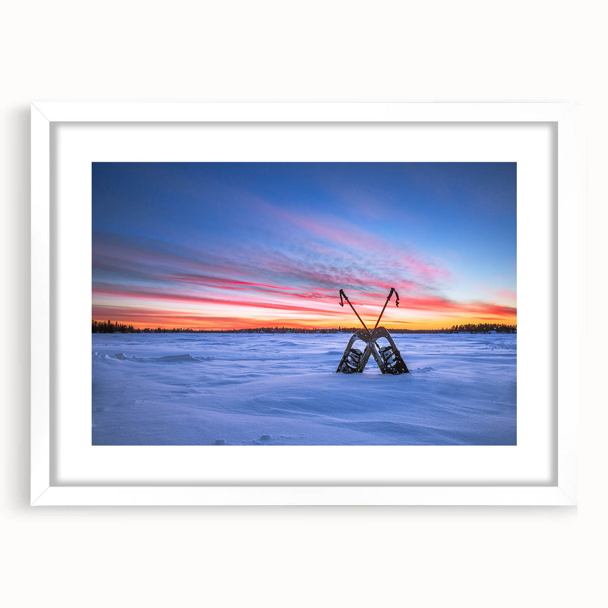 Abstract art print depicting a serene Manitoba scenery in muted blue and green tones on a framed white mat.