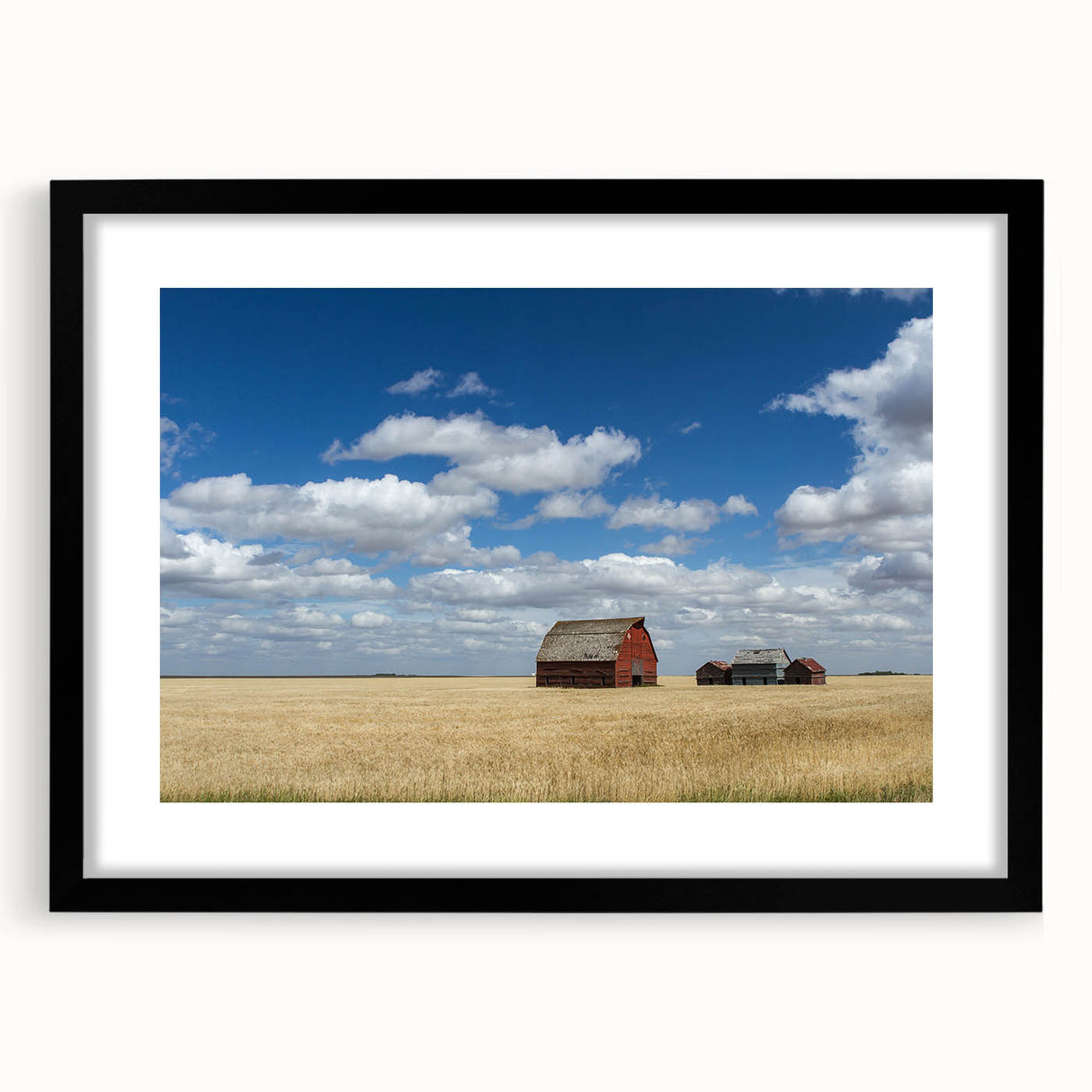 Abstract art print of colorful, textured scenery in Saskatchewan on a large black-framed canvas, ideal for living room decor.