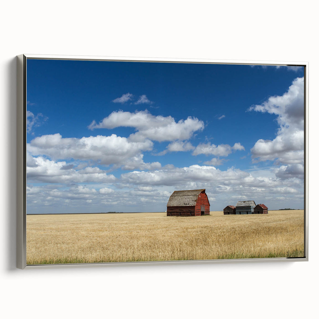 Framed canvas of a vintage-style landscape painting featuring colorful Saskatchewan scenery, ideal for living room decor.