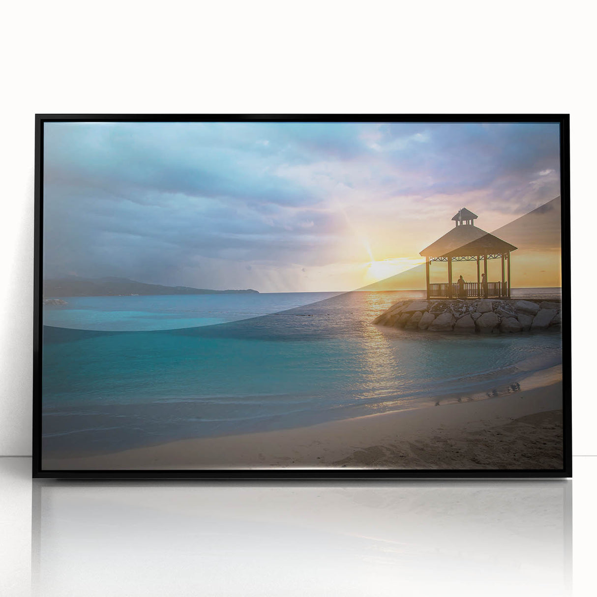 Large abstract wall art depicting a Caribbean scenery in vibrant blue and green tones, framed in black acrylic.