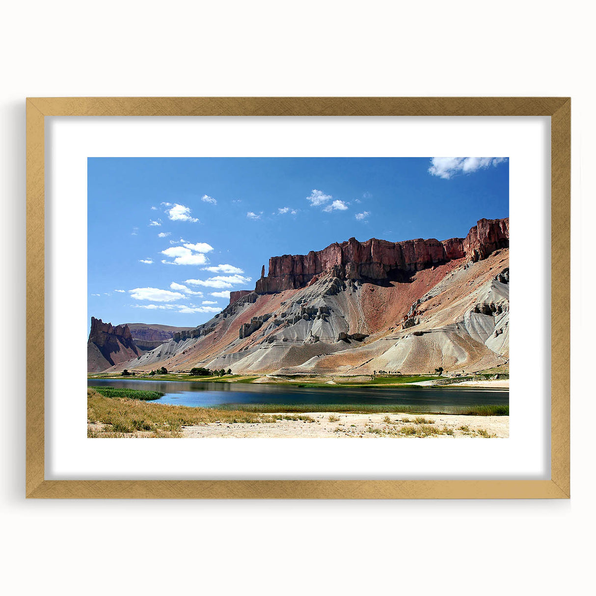 Extra large wall art featuring a textured abstract scenery of Afghanistan in muted earth tones, framed in gold.