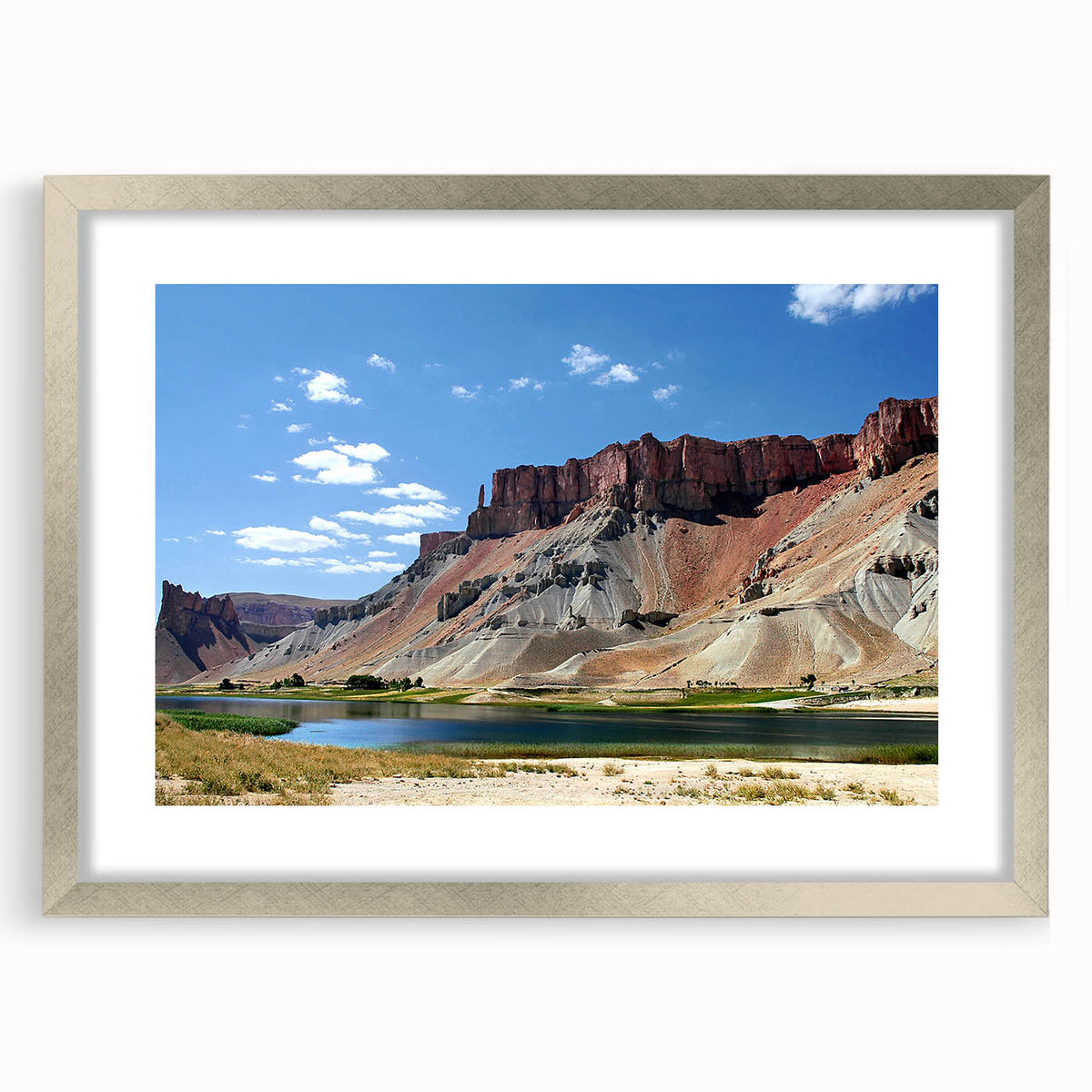 Textured abstract art print depicting a Middle Eastern landscape in earthy tones on a framed canvas.