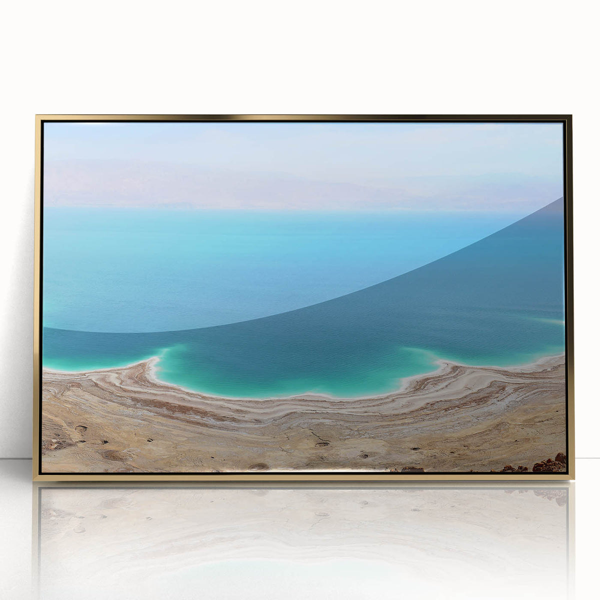 Framed acrylic print of the Dead Sea in muted blue and gold tones, ideal for modern art wall decor.