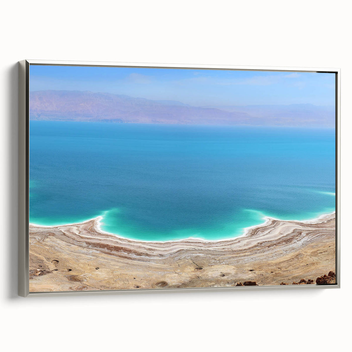 Framed canvas landscape art painting depicting the Dead Sea with muted earth tones, ideal for a study or office wall.