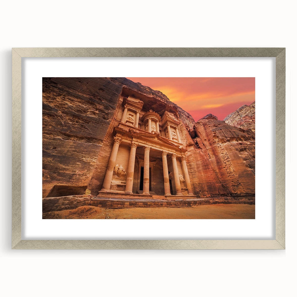 Textured art print of an abstract Jordanian landscape in muted earth tones, framed in silver, ideal for bedroom decor.