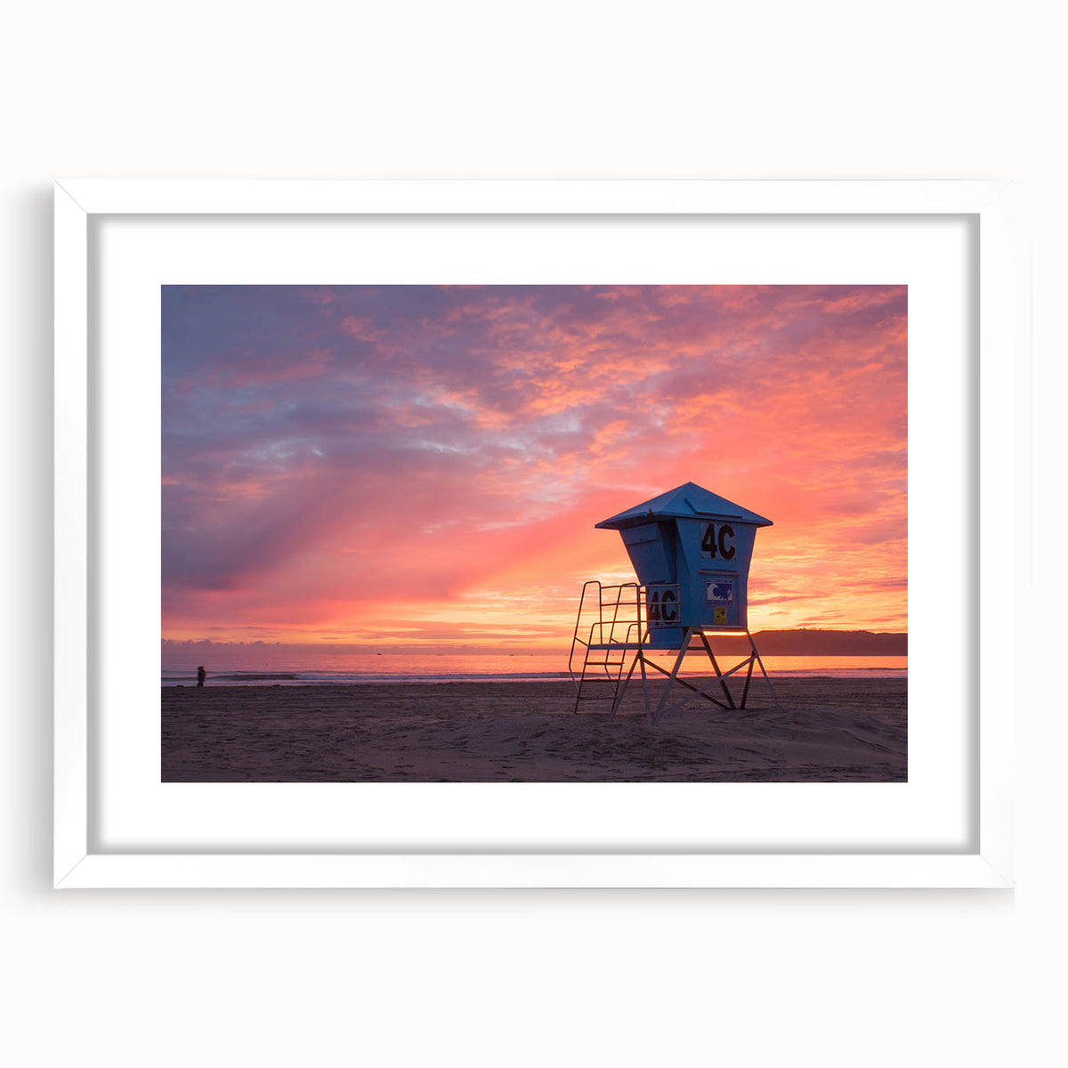 Abstract art print of Coronado, California in muted blue and gray tones on a framed white mat.