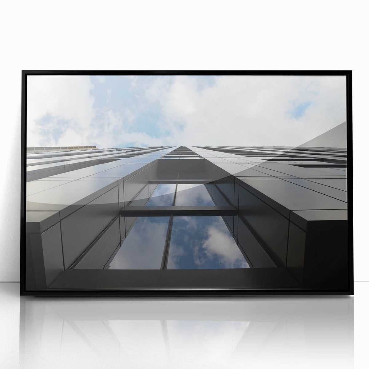 Large abstract wall art featuring a stylized Chicago skyline in black and white tones on a framed acrylic print.