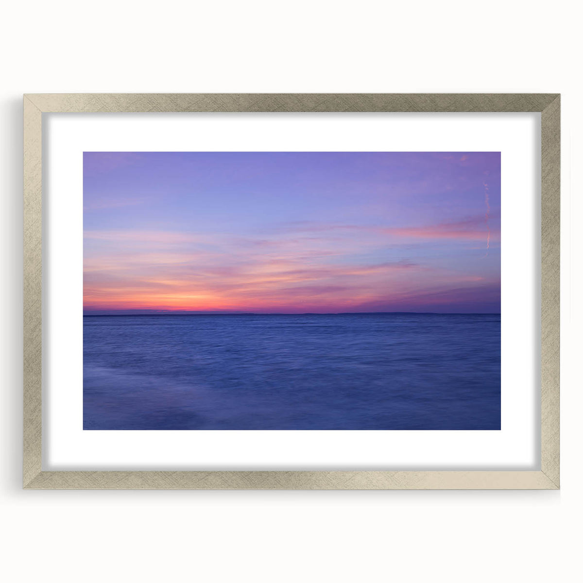 Textured abstract art print of Massachusetts Cape scenery in muted blue and gray, framed in silver, ideal for bedroom art.