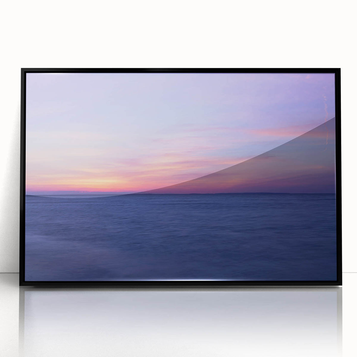 Large abstract wall art depicting a Massachusetts Cape scenery in muted gray and blue tones, framed in black acrylic.