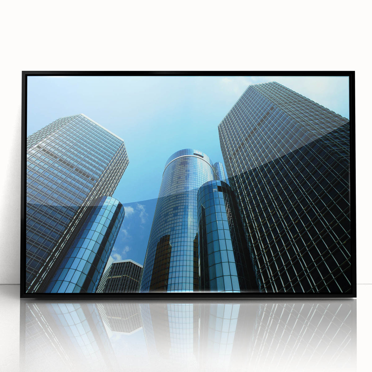 Large abstract wall art depicting Detroit skyline in muted gray and blue tones on a framed acrylic.