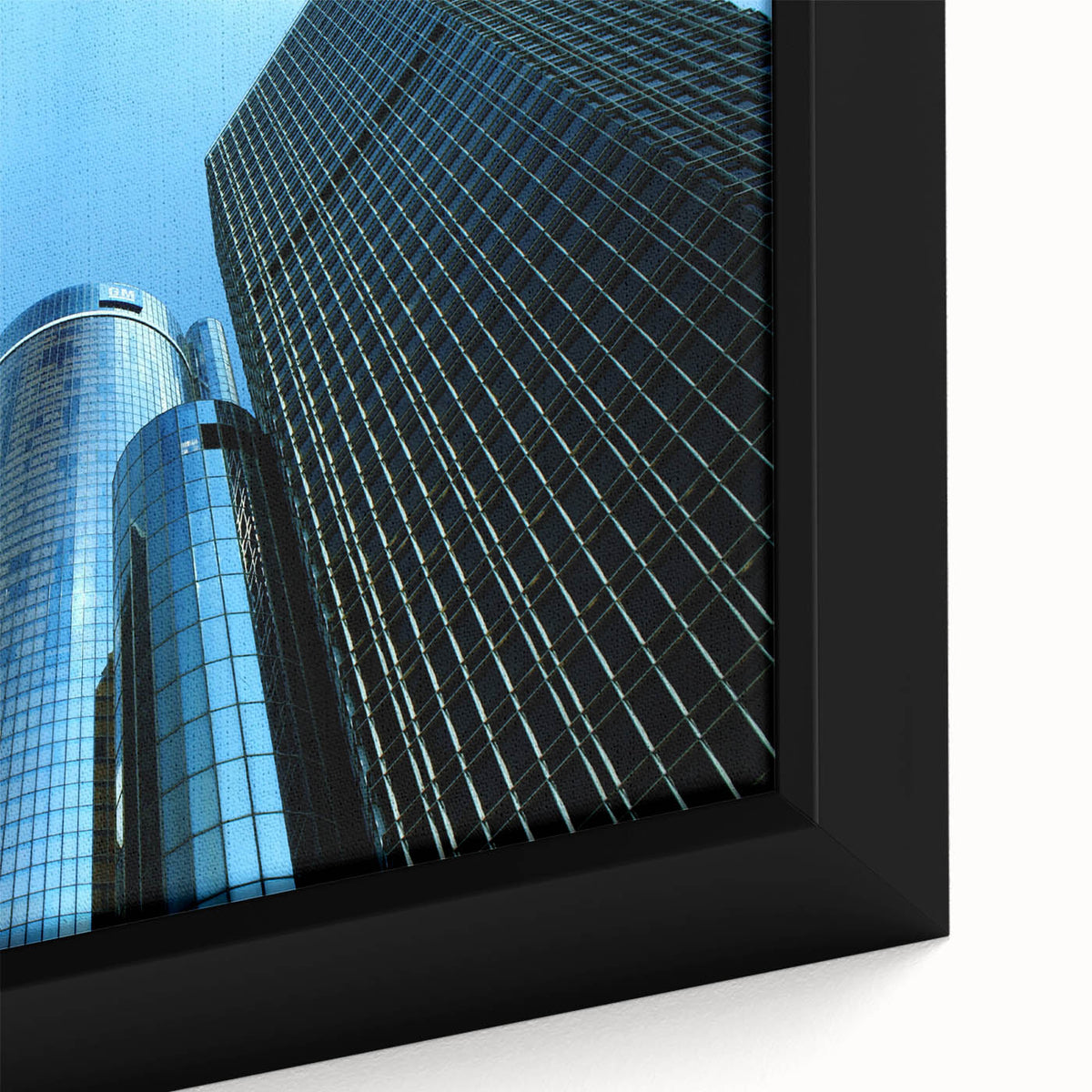 Framed canvas featuring a textured depiction of Detroit's skyline in black with colorful highlights.