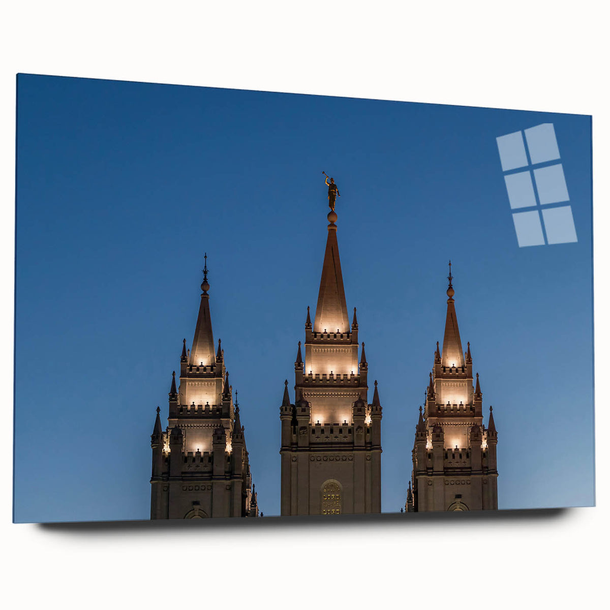 Acrylic print of a large abstract depiction of Salt Lake City, using vibrant blue and orange tones.