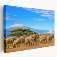 Side view of a stretched canvas featuring a serene Tanzanian landscape with vibrant green and earth tones.