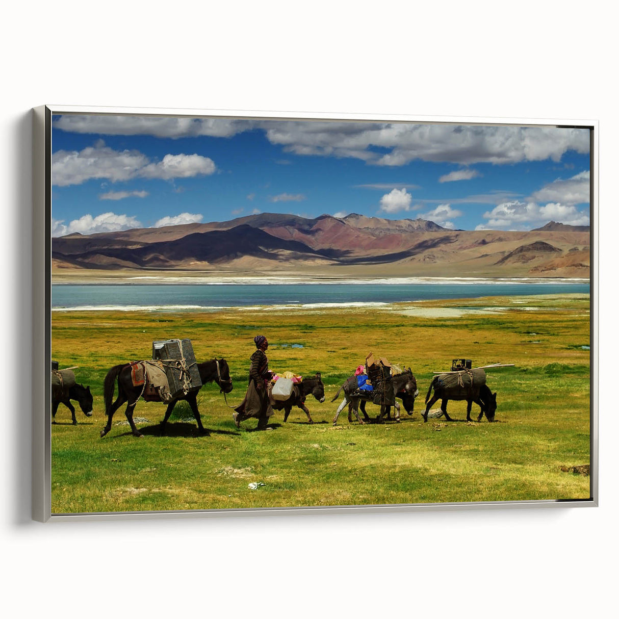 Framed canvas of a Tibetan landscape painting in muted earth tones, ideal for adding a vintage touch to any room.