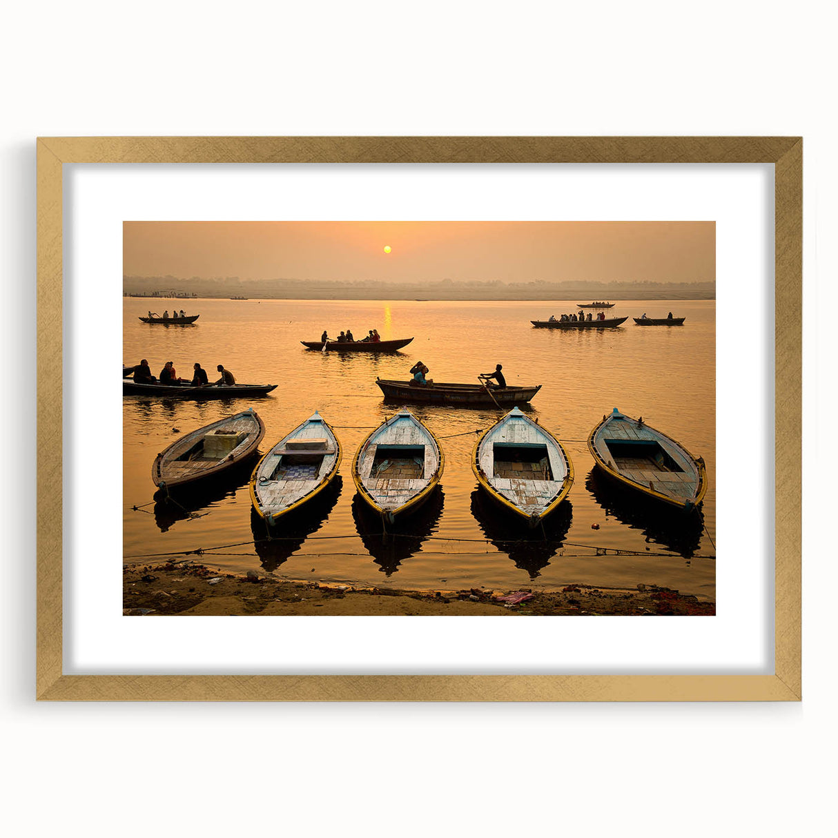 Extra large wall art featuring an abstract depiction of an Indian landscape in textured gold and earth tones.