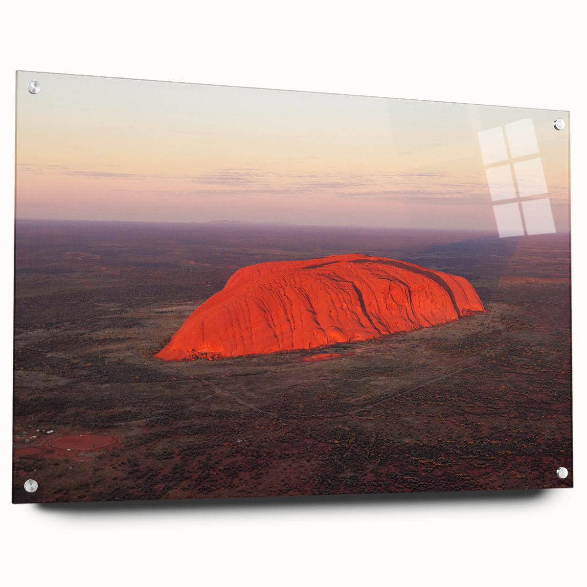 Acrylic print of Ayers Rock in Australia, featuring earthy red and orange tones, suitable for bedroom or dining room decor.