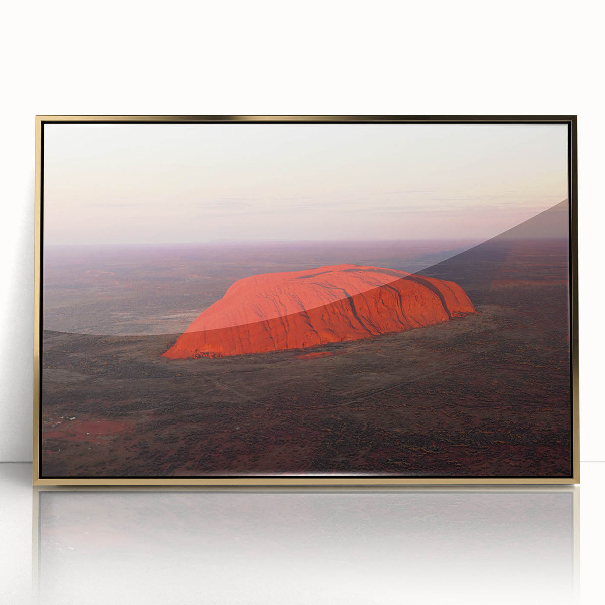 Framed acrylic print of Ayers Rock in muted earth tones, styled in mid-century modernist art, suitable for nursery wall art.