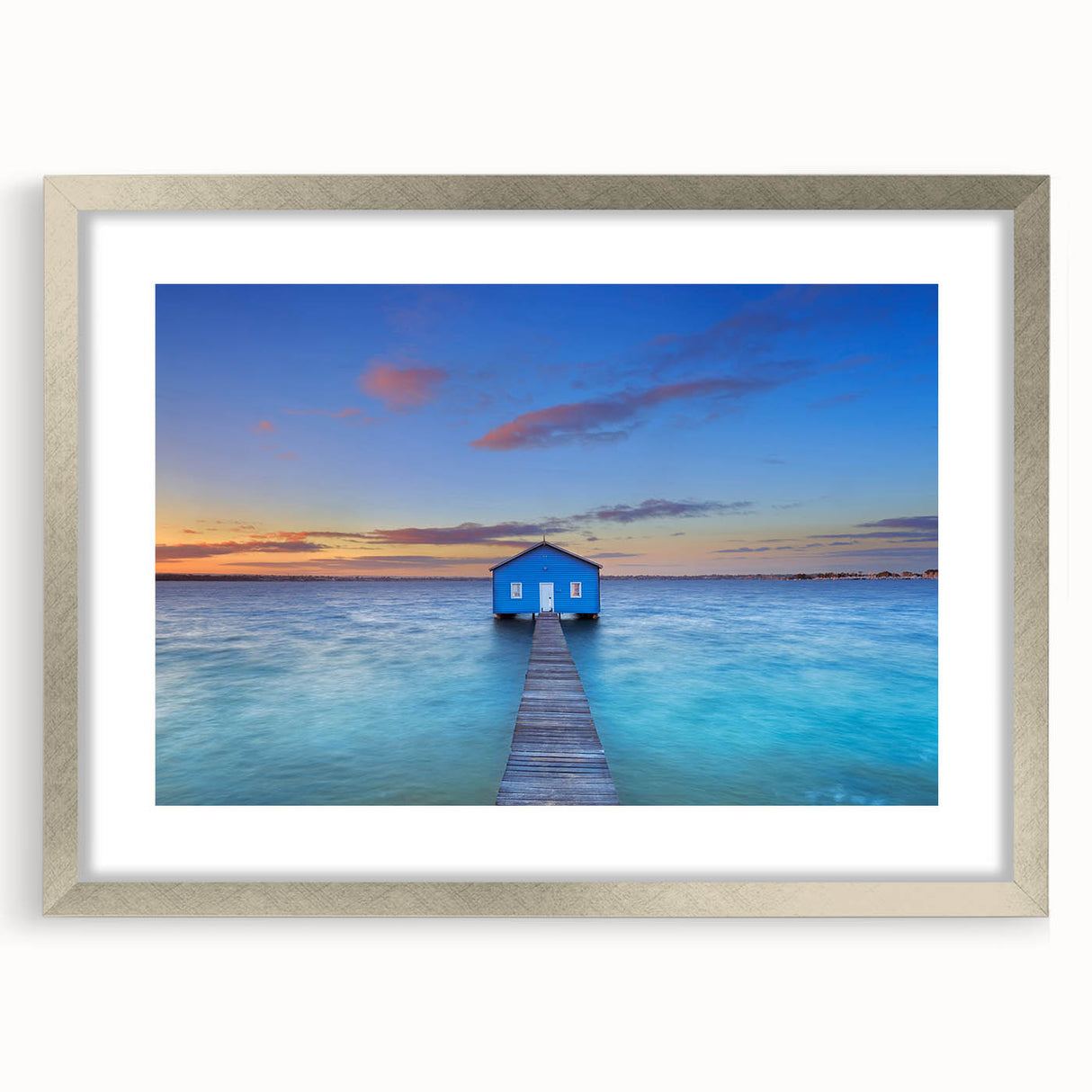 Abstract art print of Perth scenery in muted blue and silver, framed with a mat, ideal for dining room decor.