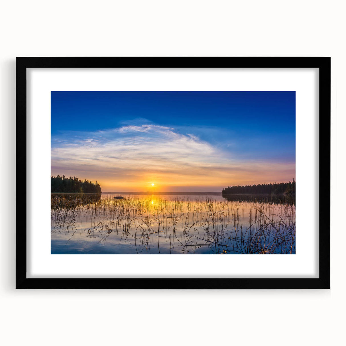 Extra large abstract art print of colorful, textured scenery, framed with a black mat, ideal for living room decor.