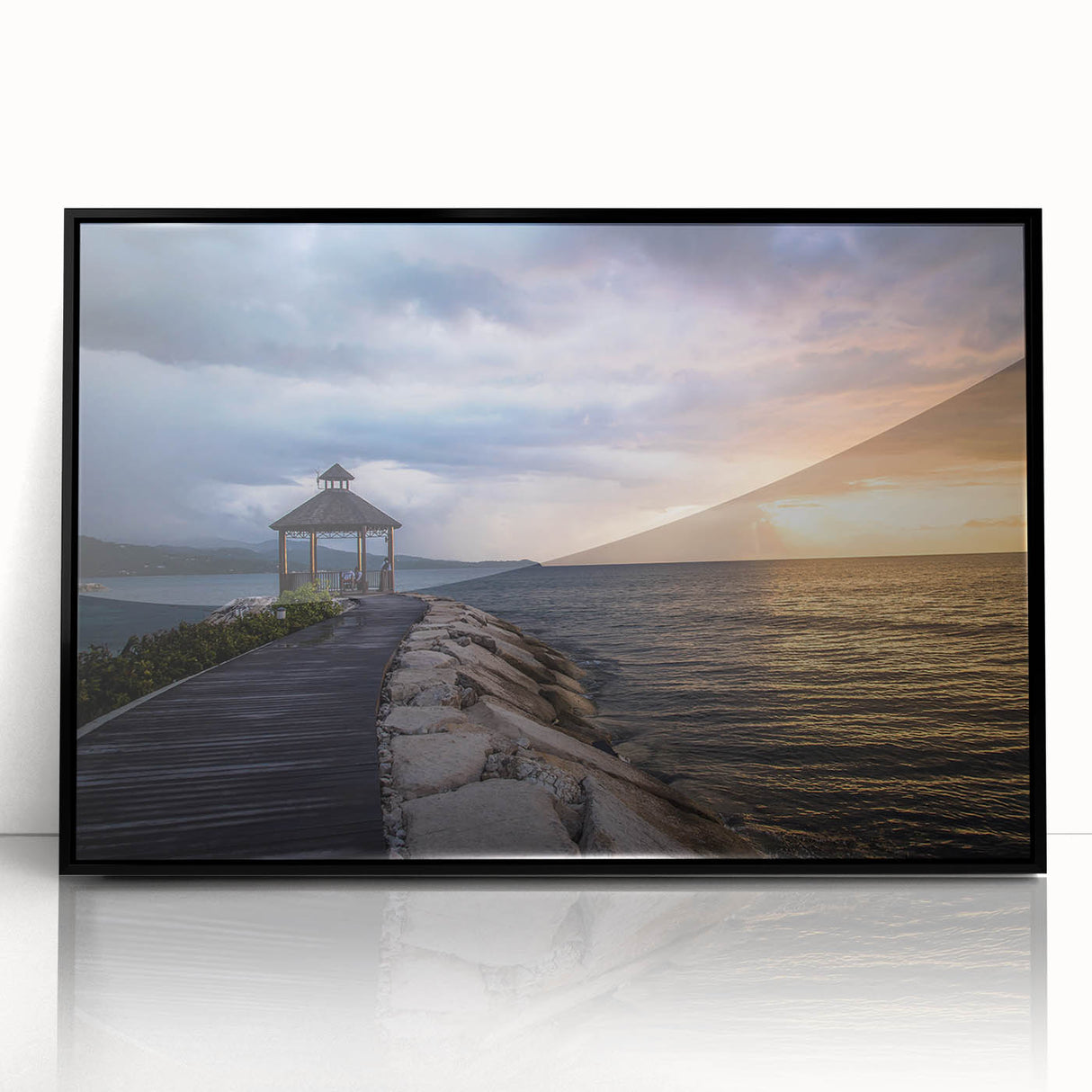 Large abstract wall art depicting a Caribbean scenery in muted green and blue tones, framed in black acrylic.