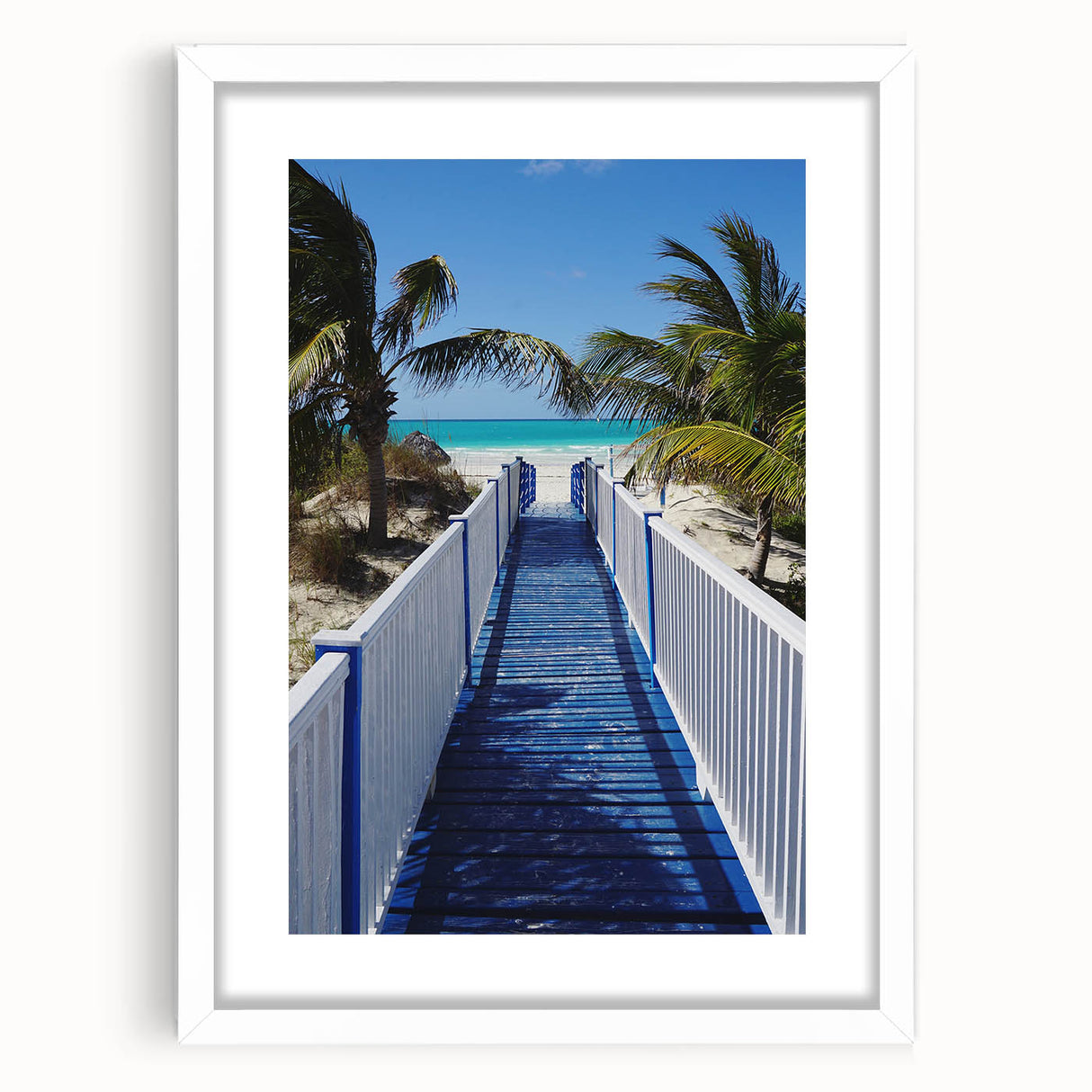 Textured abstract art print of Caribbean scenery in muted blues and greens, framed with a white mat, ideal for bedroom art.