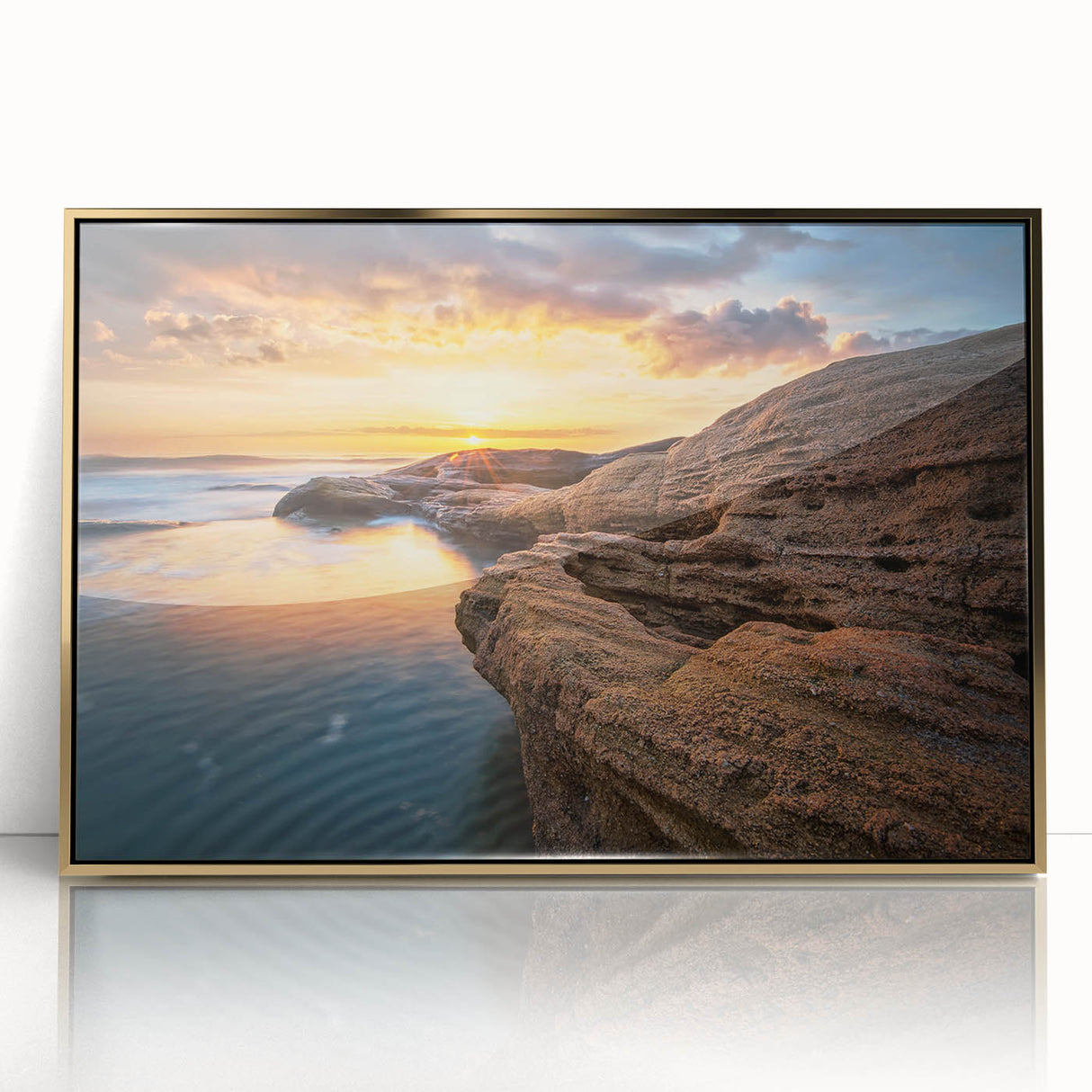 Art deco style poster depicting a scenic European landscape, with muted earth tones, framed in gold acrylic.