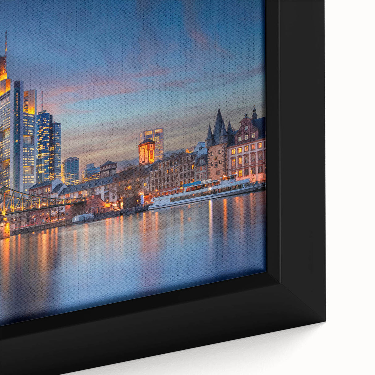 Extra large framed canvas featuring a textured depiction of a European scenery in black with colorful accents.