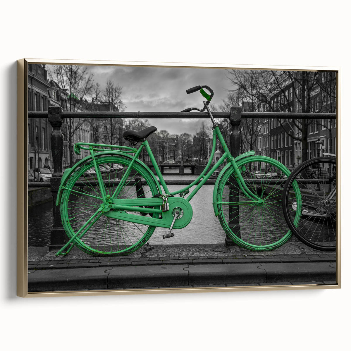 Framed canvas wall art depicting a vintage-style Amsterdam landscape in black and gold tones, suitable for bedroom decor.