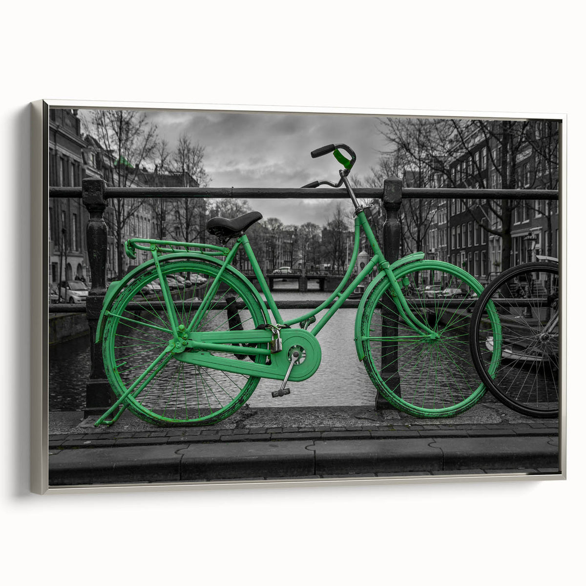 Framed canvas of a vintage-style Amsterdam landscape painting, featuring colorful buildings and black sky.