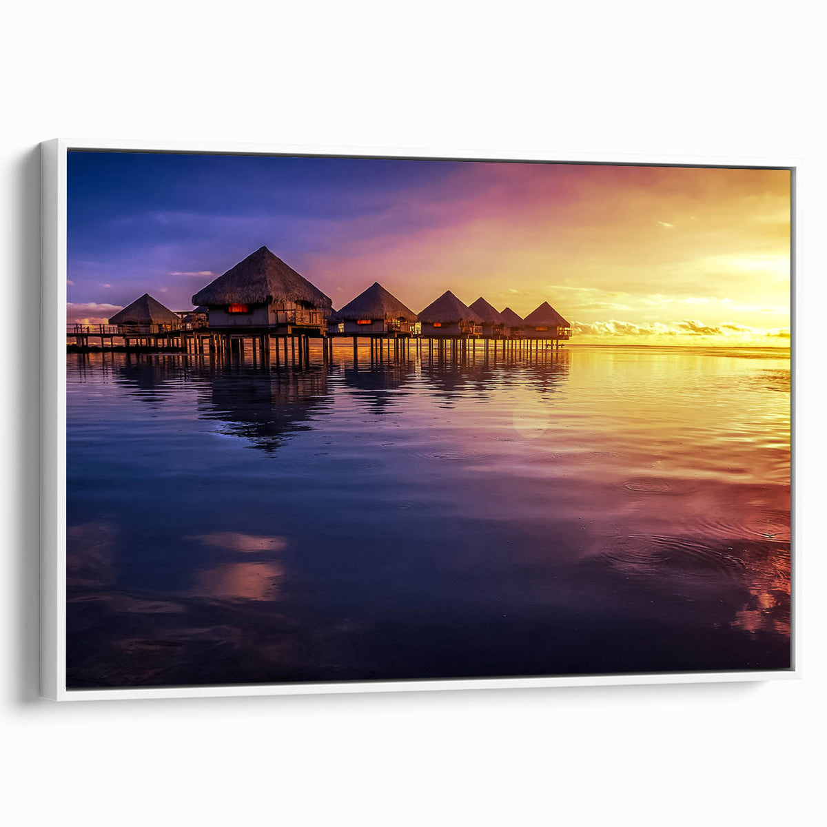 Vintage poster art of Tahiti scenery on a framed canvas, featuring vibrant ocean and sky colors, ideal for living room decor.