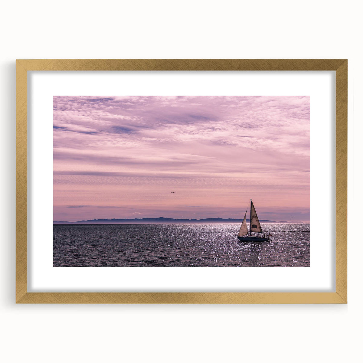 Extra large abstract art print of Santa Barbara scenery in muted earth tones on a textured canvas, framed in gold.