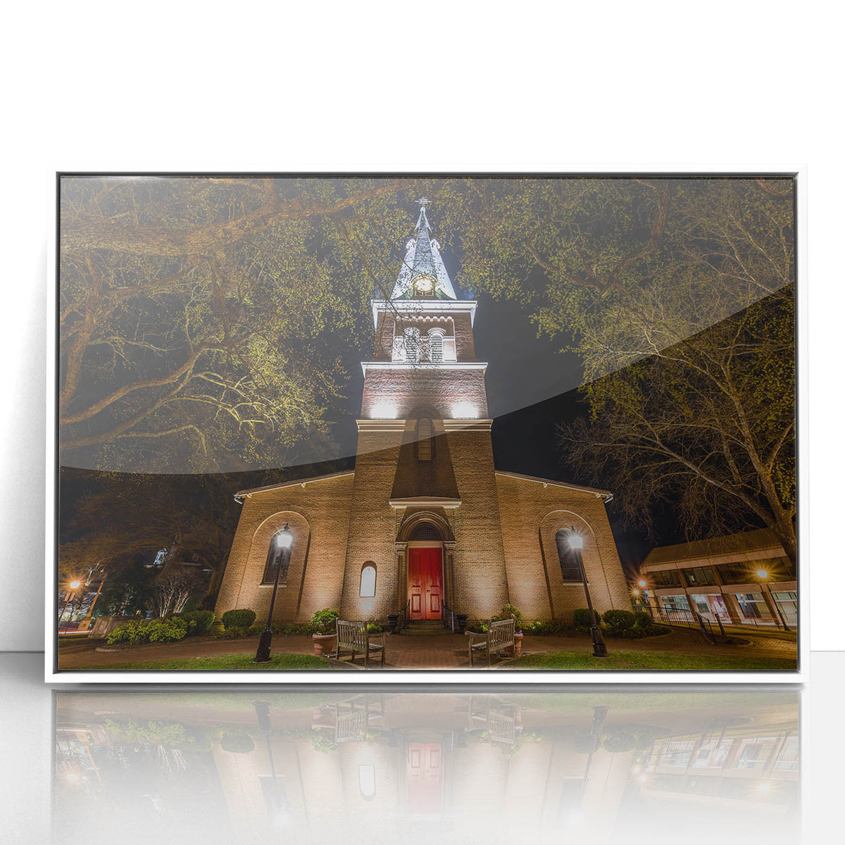 Art deco style poster of Annapolis, Maryland, featuring muted blue and white colors, framed in acrylic.