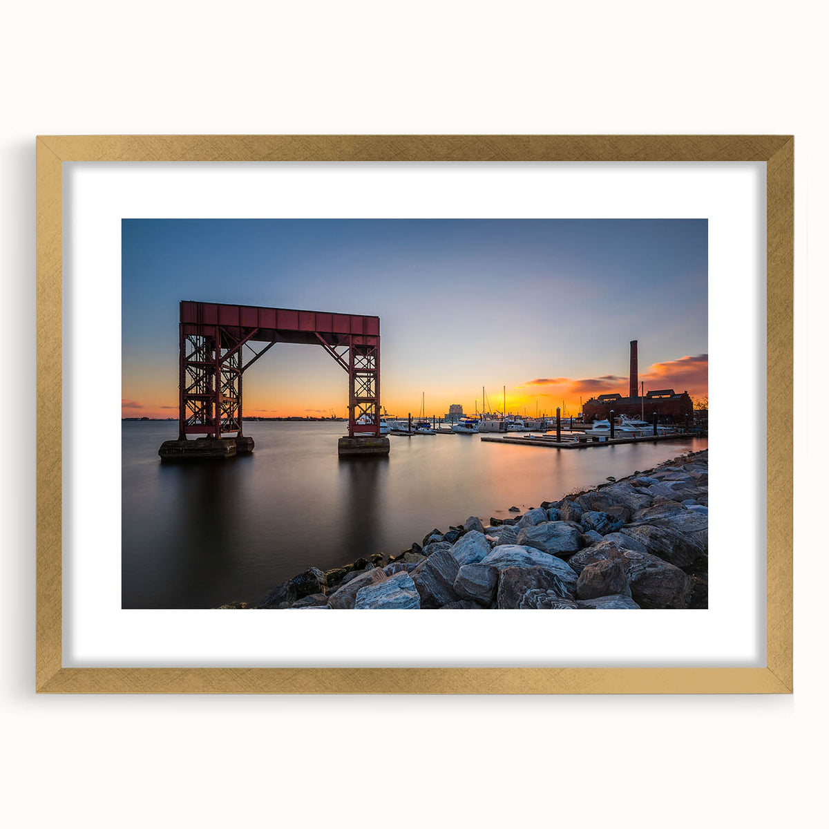 Extra large abstract art print of Baltimore skyline, featuring textured gold and blue hues on a framed canvas.