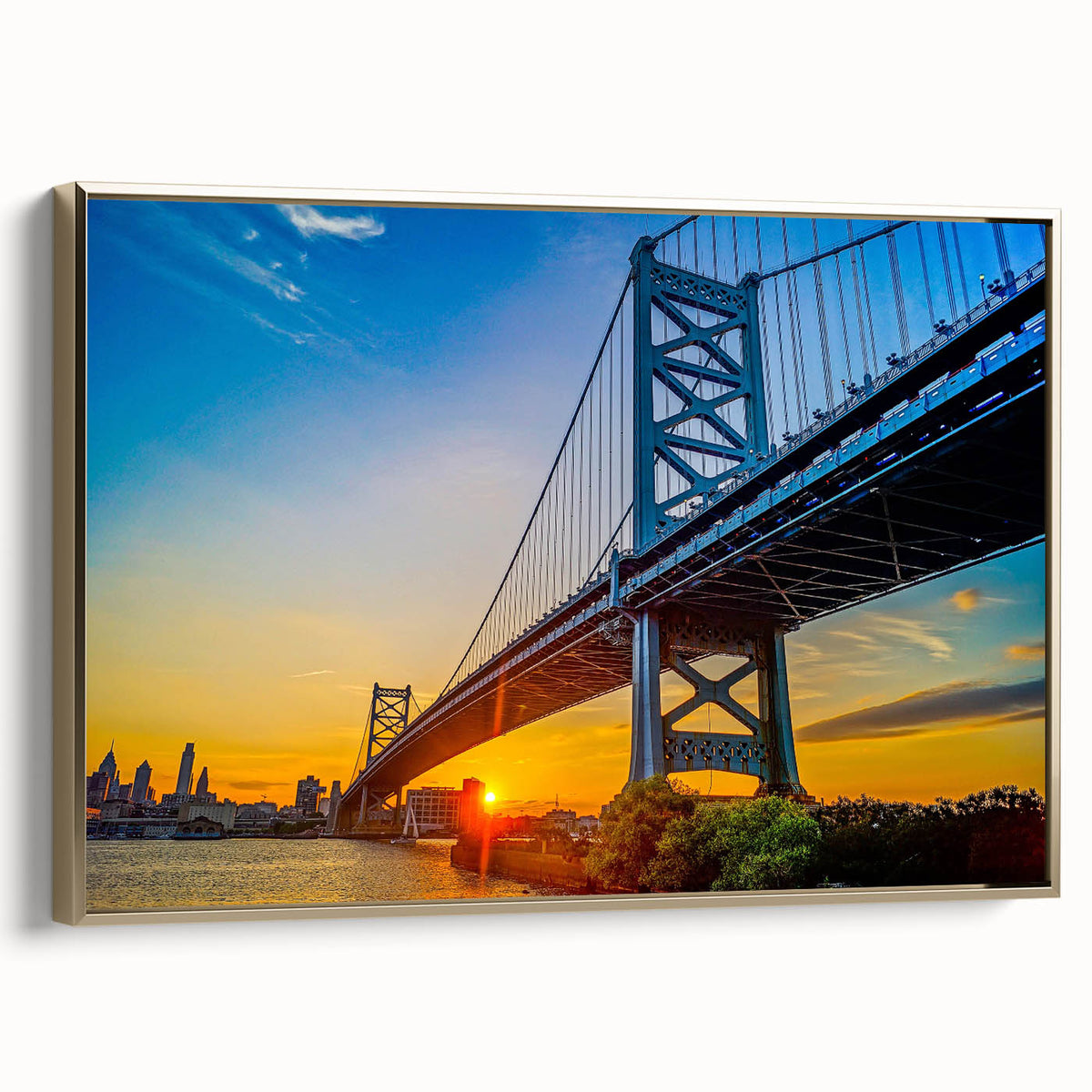 Framed canvas of Philadelphia skyline in muted gold and black tones, ideal for bedroom wall art.