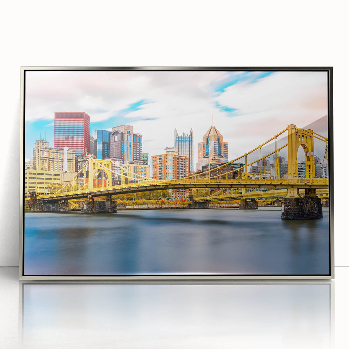 Mid-century modernist art depicting the Pittsburgh skyline in muted gray and blue tones on a framed acrylic print.