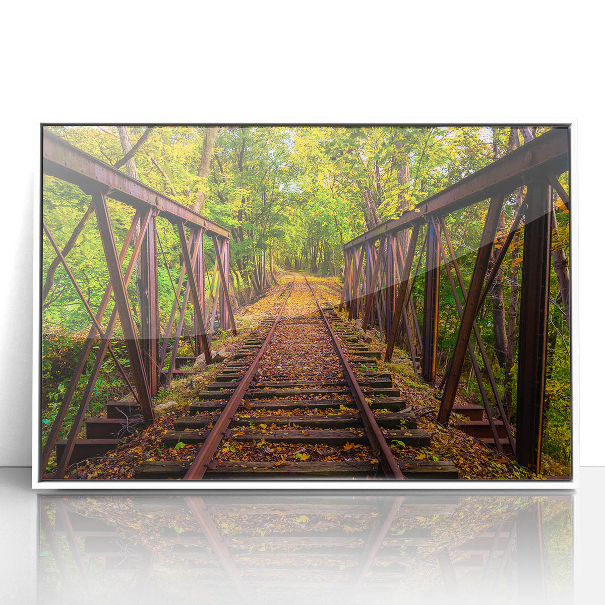 Art deco poster of Pennsylvania scenery in muted blues and greens, acrylic print framed in white.