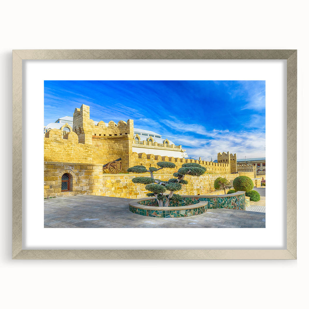 Textured abstract art print depicting rugged landscapes in muted earth tones, framed in silver, ideal for bedroom art.
