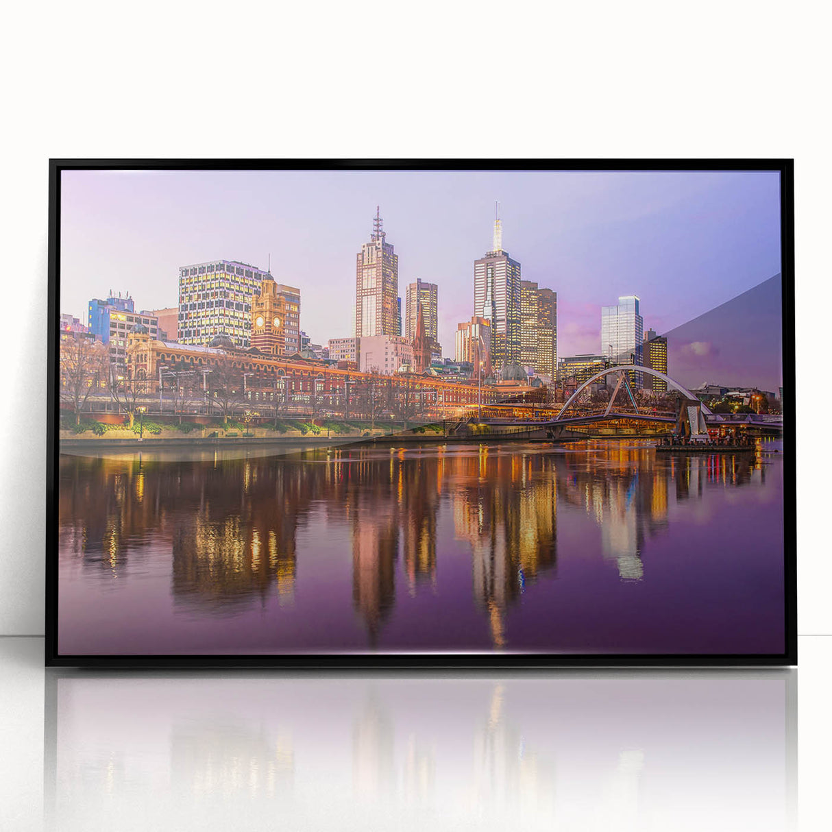 Large abstract wall art depicting Melbourne scenery in muted gray and blue tones on a framed acrylic.