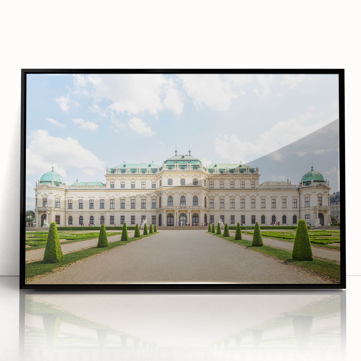 Large abstract wall art depicting a European scenery, in muted earth tones on a black framed acrylic.