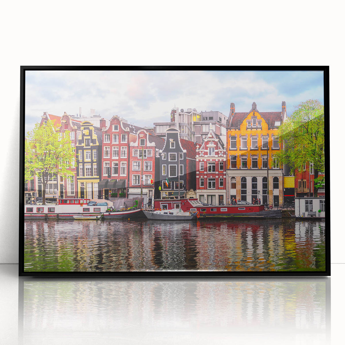 Large abstract wall art depicting a European scenery in muted earth tones, framed in black acrylic.
