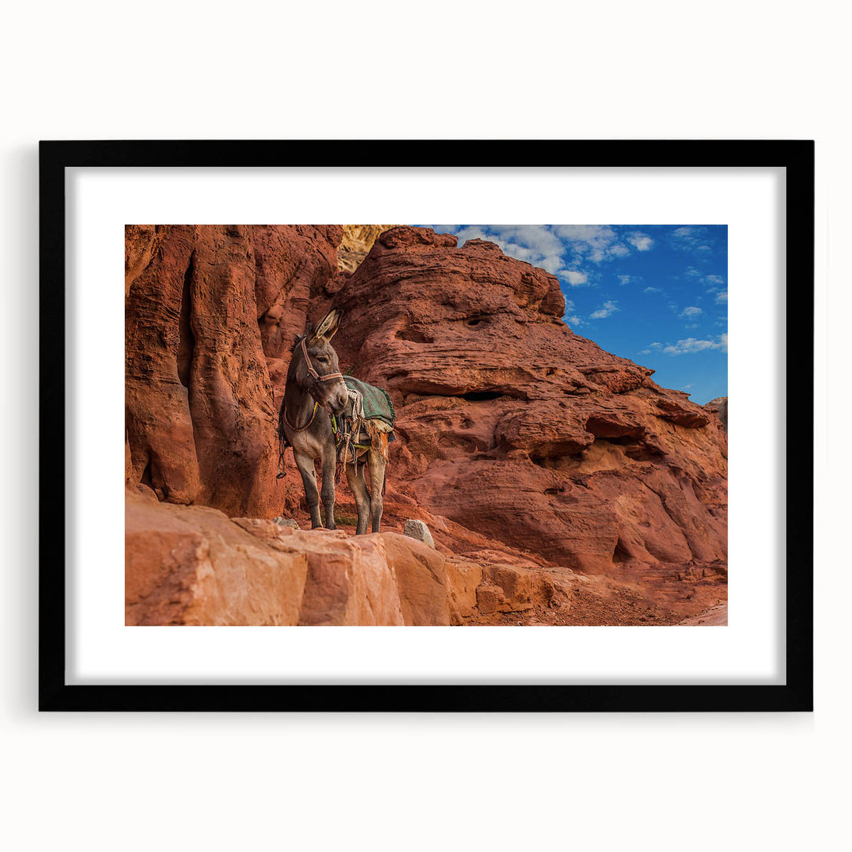Extra large abstract art print depicting a colorful, textured scenery of Afghanistan, framed in black.