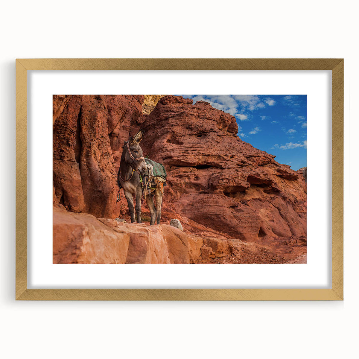 Extra large abstract art print depicting a textured Middle Eastern scenery in muted earth tones, framed in gold.