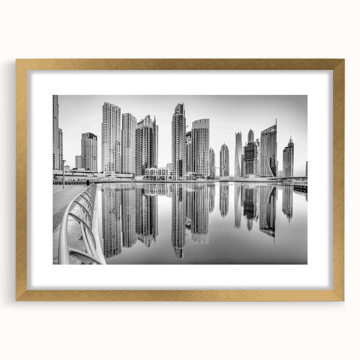 Extra large abstract art print of Dubai skyline in textured gold tones on a framed canvas, ideal for living room decor.